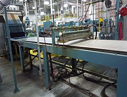 An image of a carpet factory and its machines