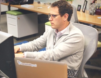 Man busy working on his computer