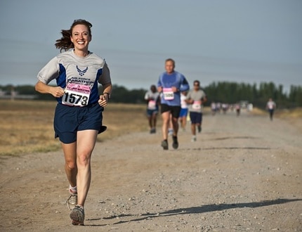 Woman smiling while running 