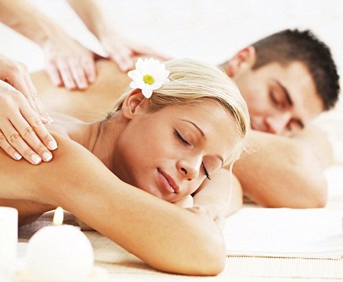 Couple having a massage in a spa