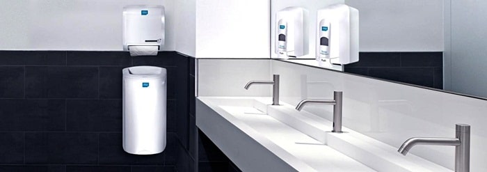 Clean washroon with soap dispensers by Alsco