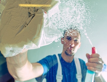 Man wearing blue cleaning