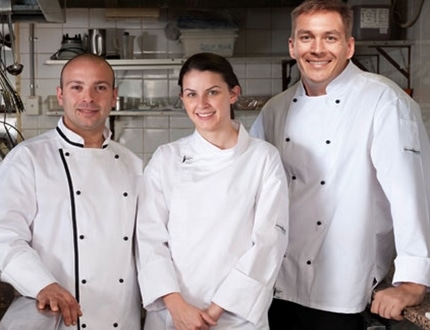 Three chefs with white uniform