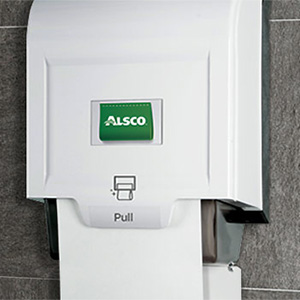 Alsco white paper towel dispenser mounted on the wall