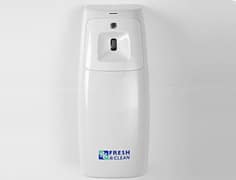 white air freshener mounted to a white wall
