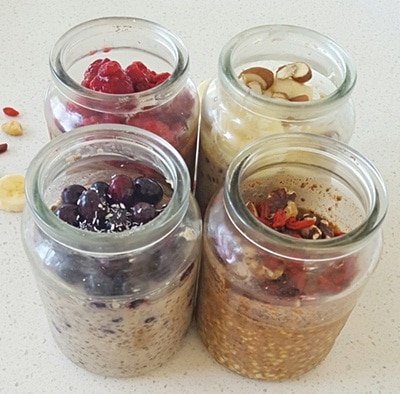 Four jars with healthy foods inside