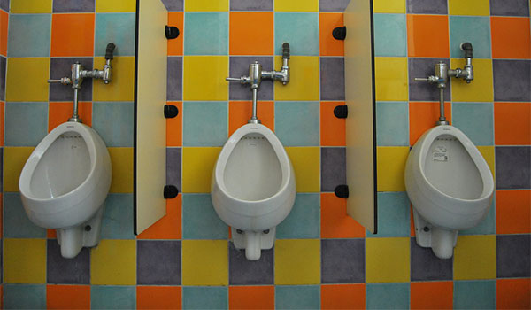 colourful tiles in male toilet room