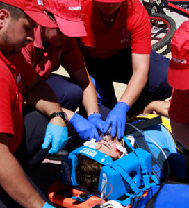 people performing first aid medical care