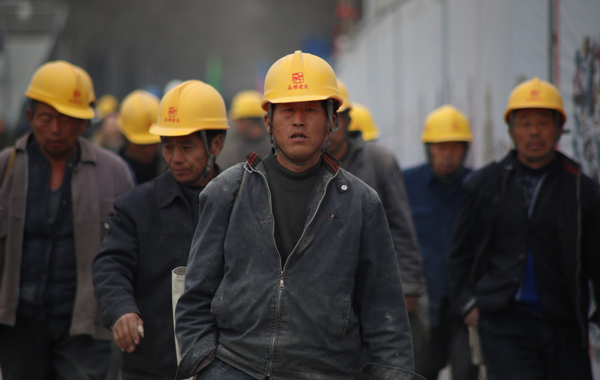 group of person wearing yellow safety helmet