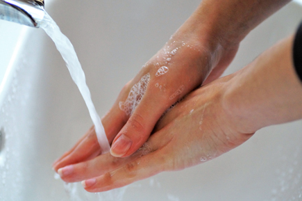 person hand washing